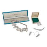 Georg Jensen: Bracelet, brooch and earrings together with a brooch by Anton Michelson (4)