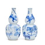 A pair of Chinese 'Animal' gourd vases Late Qing dynasty