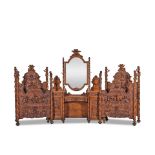 Important mobilier de chambre, en noyer et bois sculpté attribué à Luiggi Frullin...