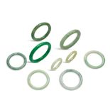 NINE JADE AND HARDSTONE BANGLES 20th century (9)