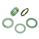 FIVE JADE AND JADEITE BANGLES 20th century (5)