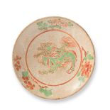 A GREEN AND RED ENAMELLED 'LION' DISH Jin/Yuan Dynasty
