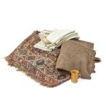 A late 19th / early 20th century Qashqai rug, together with a selection of blankets and cloths S...