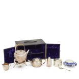 Christopher Dresser: A cased silver travelling tea set, by Jonathan Wilson Hukin & John Thomas H...