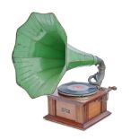 A mahogany cased gramophone bearing trade label for the Gramophone company 21 City road London.