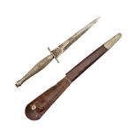 A WORLD WAR II FIRST PATTERN FAIRBAIRN-SYKES COMMANDO KNIFE WITH 'S' GUARD AND SHEATH.