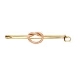 CARTIER: A 14K GOLD SAFETY PIN BROOCH