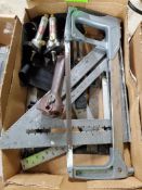 Assorted saws, squares, and tooling.