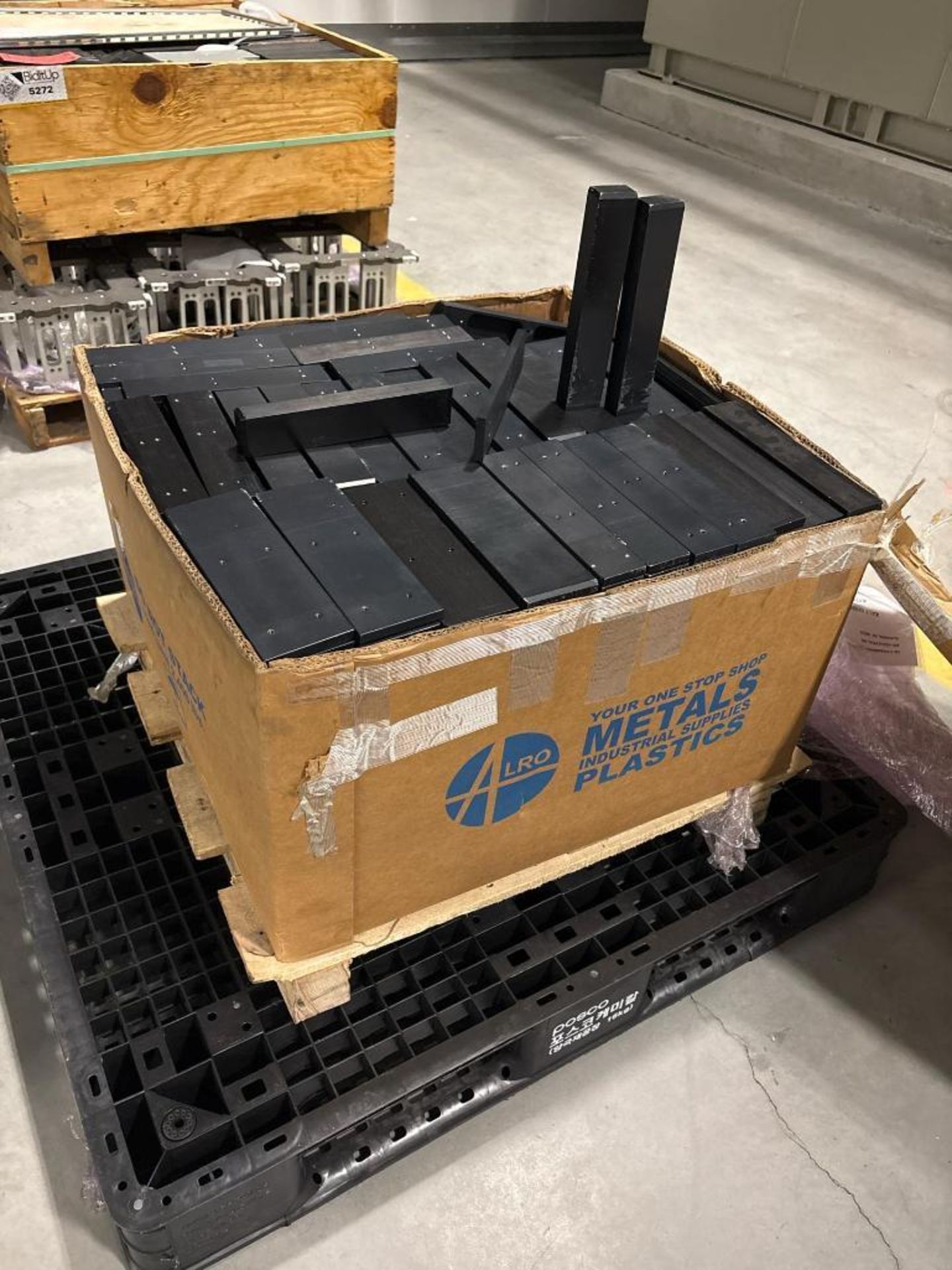 Pallet Edge Riser Black Anodized Aluminum mounting blocks and risers. ; Pallet of heavy ...