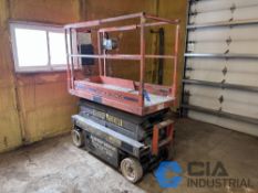 SKYJACK MODEL M3219 ELECTRIC SCISSOR LIFT; S/N 220611, 66" LONG X 26" WIDE DECK WITH 37" DECK