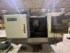 Samsung MCV 50 Vertical Machining Center. Date of Mfg.: 2010 with Fanuc 0i-MD control