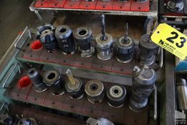 (12) ASSORTED CAT TOOL HOLDERS