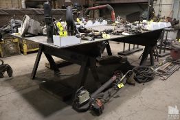 STEEL TABLE CONSISTING OF TWO 6' SAW HORSES AND 7' X 11' X .5" STEEL PLATE TOP