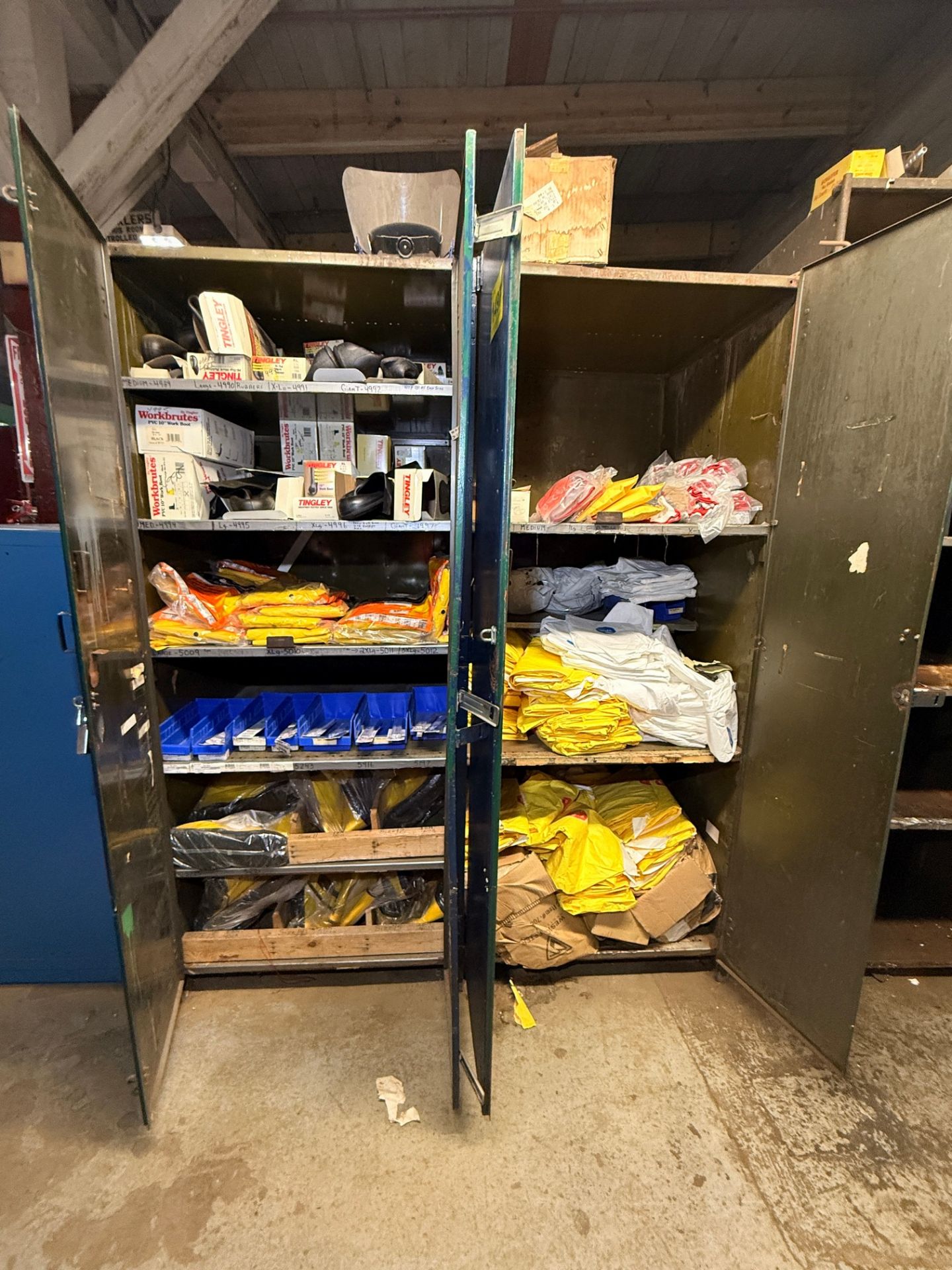 (1) Lot of (2) storage cabinets to include safety gloves, overalls ...