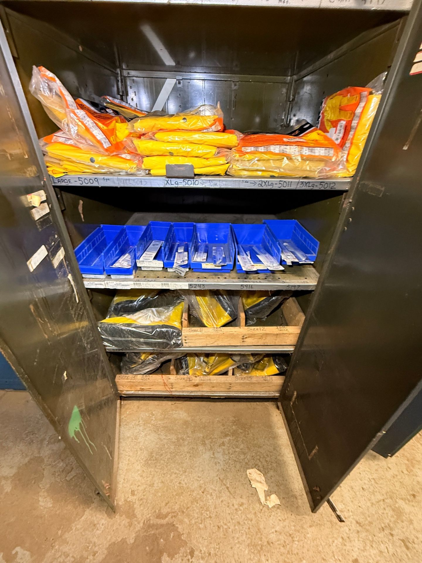 (1) Lot of (2) storage cabinets to include safety gloves, overalls ...