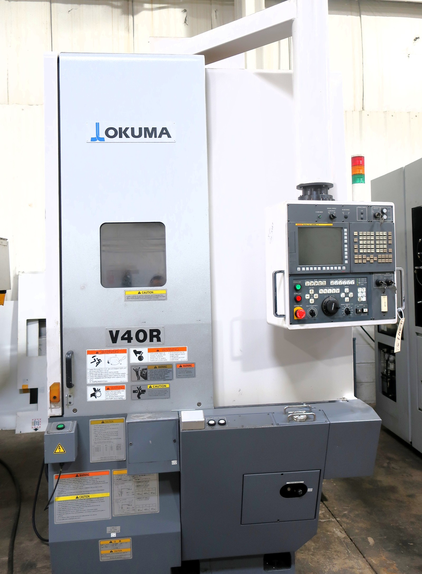 OKUMA V40R CNC 3-AXIS VERTICAL LATHE, S/N 164028, NEW 2012
