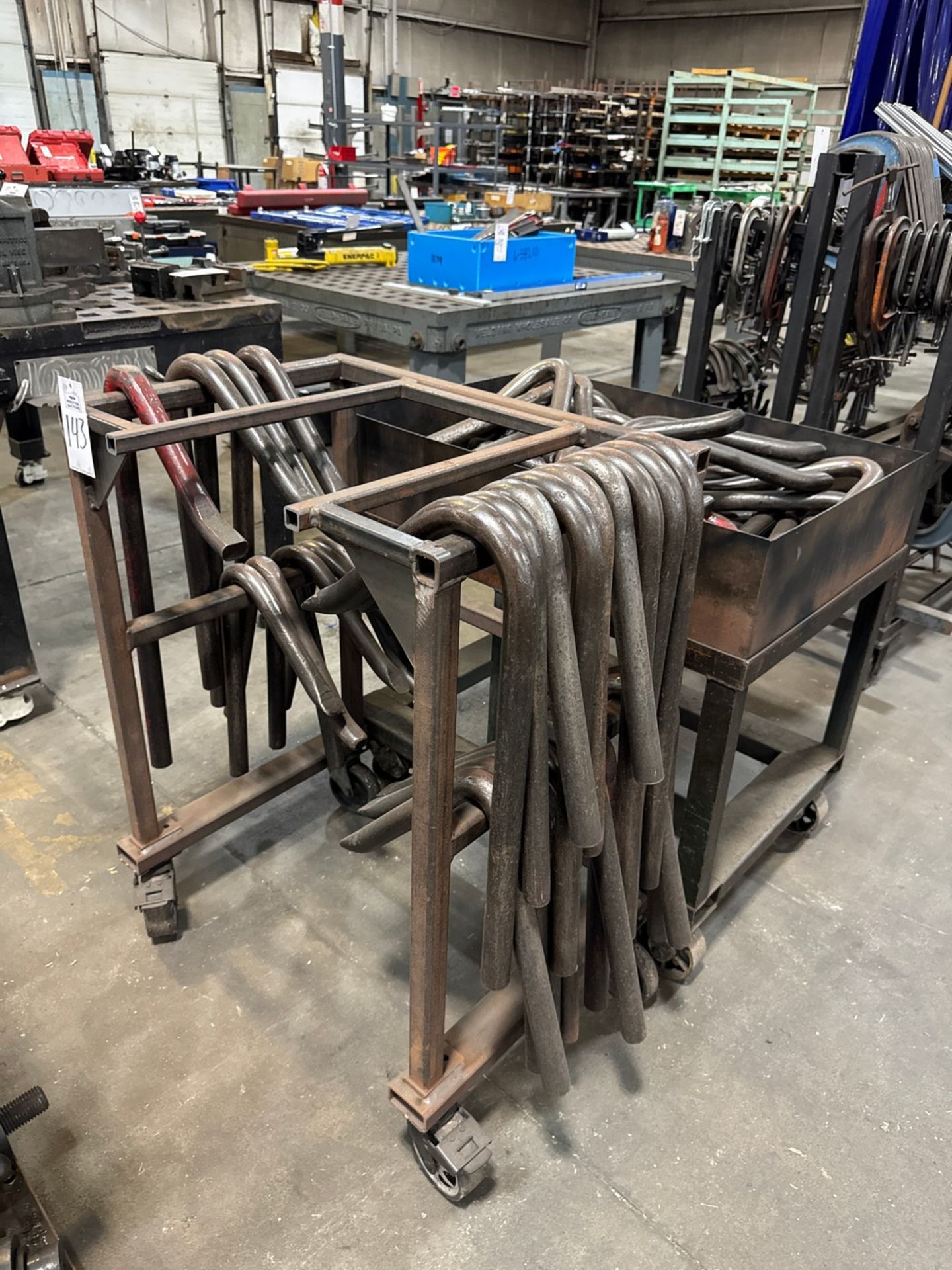 Lot of Assorted Welding Table Gooseneck Hold-Downs with Storage Rack
