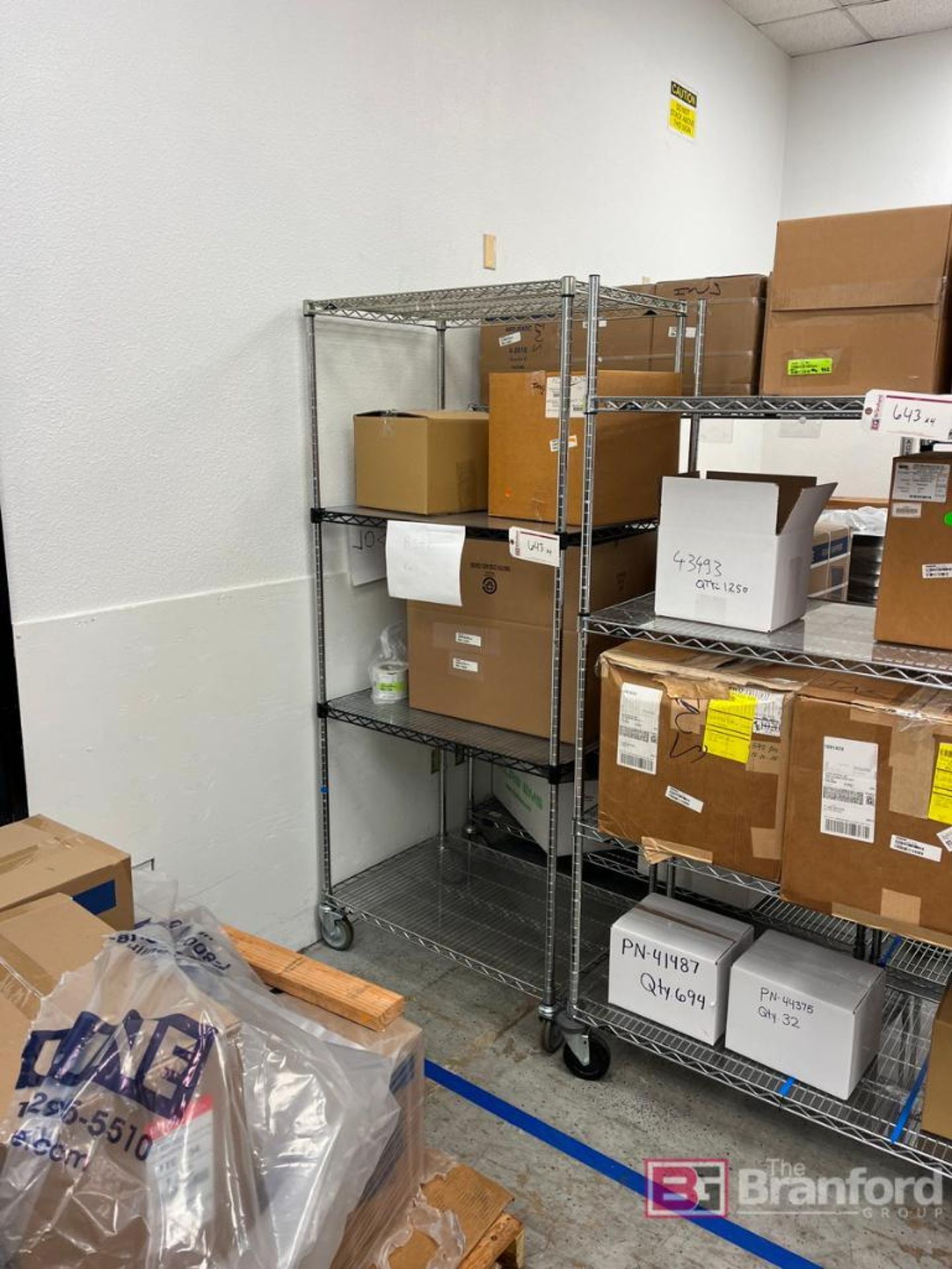 Uline Box Racking Lot of (4) Uline Metal Racking on Casters; Contents not included