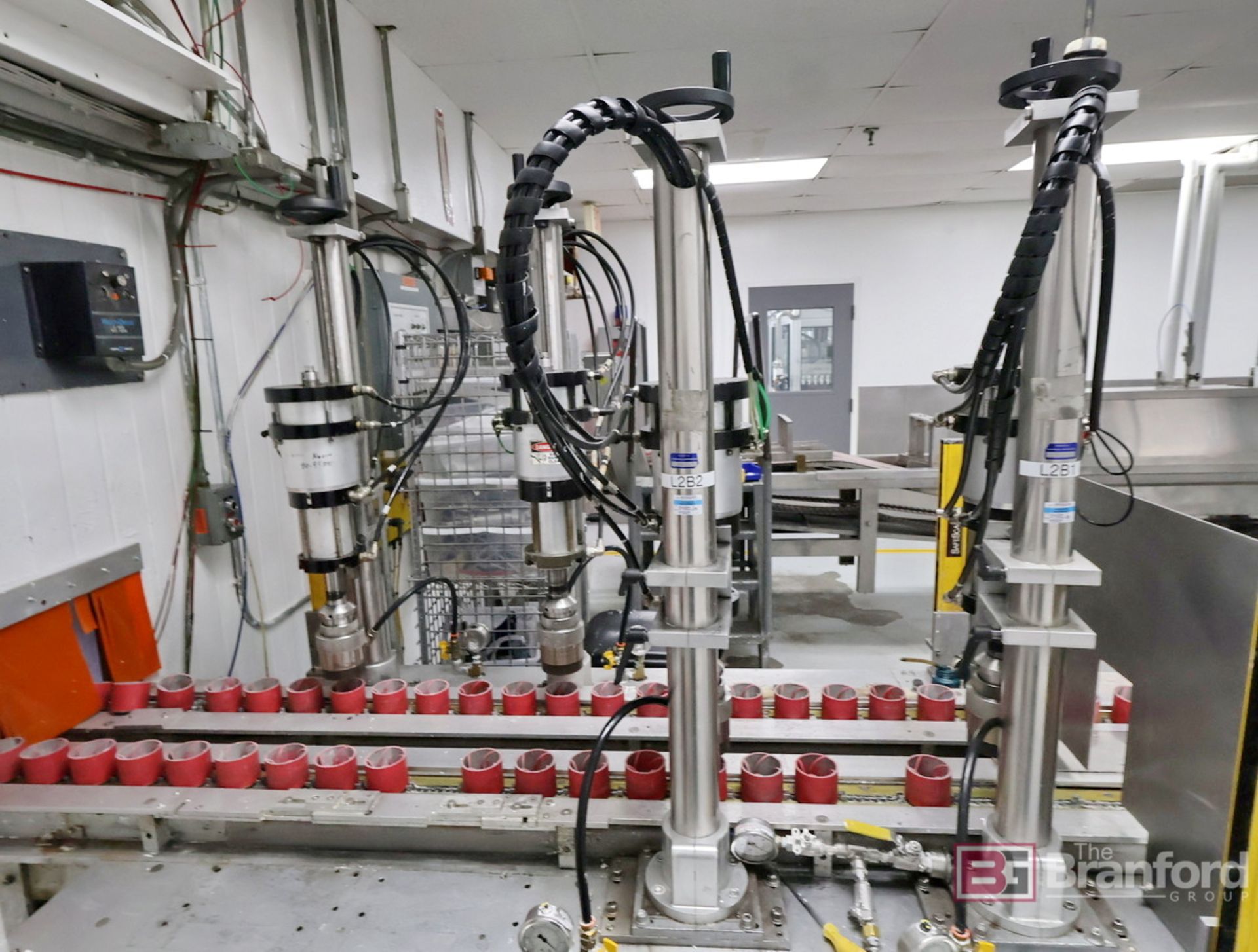 4-Head Dual Station Puck Capper System