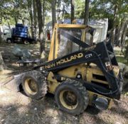 Ford New Holland Skid Steer L555 Deluxe Diesel with 64" Wide Front Bucket, 4323.6 Hours Displayin...