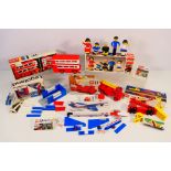 Lego - A group of vintage 1970s boxed Lego sets, Lego Family # 200, London Bus # 313, Garage # 348,