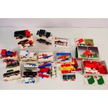 Lego - A group of vintage 1970s Lego sets, Bungalow # 344, Ambulance # 600, Excavator # 604,