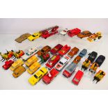 Dinky Toys - An unboxed collection of approximately 30 diecast model vehicles from Dinky Toys.