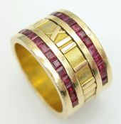 A Tiffany and Co. 18K Gold and Ruby Band Ring. 13mm width. Roman numeral markings of I - XII. Two