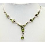 An Elegant, Vintage Sterling Silver Peridot Set Necklace-39.5cm Length. The Centre Pendant section