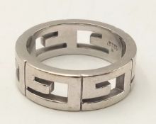 A Designer Gucci Sterling Silver Ring. Openwork design. Size Q. 10g.