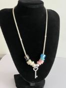 Genuine PANDORA SILVER NECKLACE. Complete with 10 x ENAMELLED SILVER CHARMS and SILVER KEY