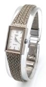 An Elegant Vintage Ladies Stainless Steel Dress Watch by Rotary. Case measures 16 x 12mm. Woven