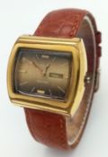 A Vintage Favre Leuba Sea Raider Watch. Brown leather strap. Gilded case - 32mm. Missing crown and