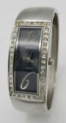 A COSMOPOLITAN, STONE SET, STEEL BANGLE WATCH. IN FULL WORKING ORDER. NEW BATTERY FITTED RECENTLY.