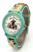 A 1990'S, WALLACE AND GROMIT STRAP WATCH. IN ORIGINAL WATCH TIN. IN FULL WORKING ORDER. NEW