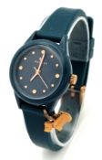 A RADLEY LONDON, PETROL BLUE, RUBBER STRAP WATCH WITH ROSE GOLD ACCENTS. ORIGINAL STRAP AND