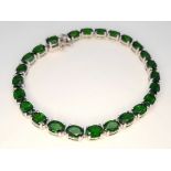 A Stylish Sterling Silver and Green Chrome Diopside Tennis Bracelet-20cm Length. Set with Twenty-