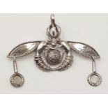 A STERLING SILVER, BROOCH / PENDANT IN THE DESIGN OF THE MALIA BEES MINOAN. THE ORIGINAL GOLDEN