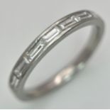 A PLATINUM, BAGUETTE DIAMOND SET, HALF ETERNITY RING. 3.6G, SIZE N. SP 1003