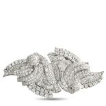 A Platinum 7.50ct Diamond Brooch. This luxury brooch is filled with dramatic details. Along with