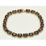 A 9K Yellow Gold Mystic Topaz Tennis Bracelet. 19cm length. Beautiful colours. 14.28g total