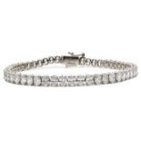 A 6ctw Lab-Grown Oval Cut Diamond Tennis Bracelet set in 9K White Gold. 7 inch length. 9.10g total