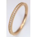A 14K YELLOW GOLD, DIAMOND SET, FULL ETERNITY RING. 1G, SIZE L. SC 5031