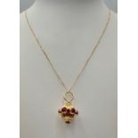 A Beautiful and Completely Unique Faberge Inspired 18 Carat Gold and Ruby Bauble Pendant Necklace-