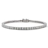 A 9K White Gold Lab-Grown Diamond Tennis Bracelet. 6ctw princess cut diamonds. 7 inches length. 7.