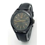 A Tag Heuer Formula 1 Quartz Ladies Watch. Model WBJ1314. Black leather strap. PVD case - 36mm.