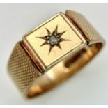 A 9K Yellow Gold Diamond Signet Ring. Chester hallmarks. Size T. 5.65g.