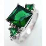 Attractive SILVER RING set with GREEN GARNET GEMSTONES. Having Square Cut Centre Stone with
