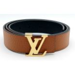 A Louis Vuitton Brown Taurillon Leather LV Initiales Reversible Belt. Brown grained leather exterior