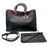 A Christian Dior Black Grained Leather Diorissimo Tote Bag. Black grained leather exterior with